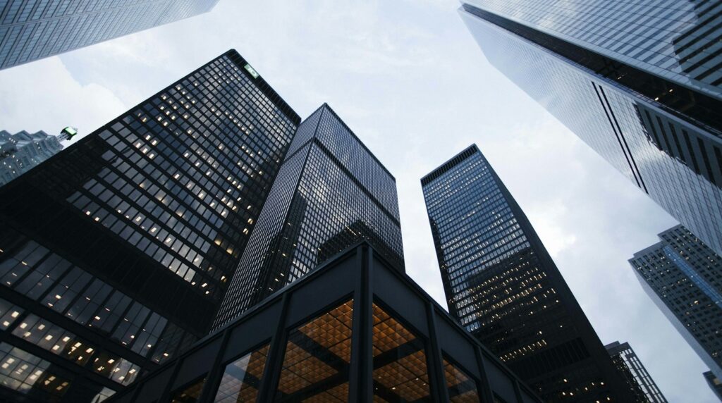 Modern enterprise corporate architecture representing Acumatica and NetSuite cloud ERP comparison